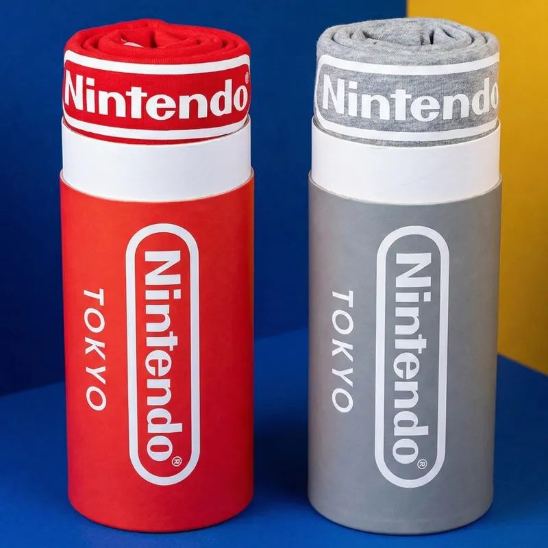 Nintendo markalı tekstil ürünleri için üretilmiş kırmızı ve gri silindir karton kutular